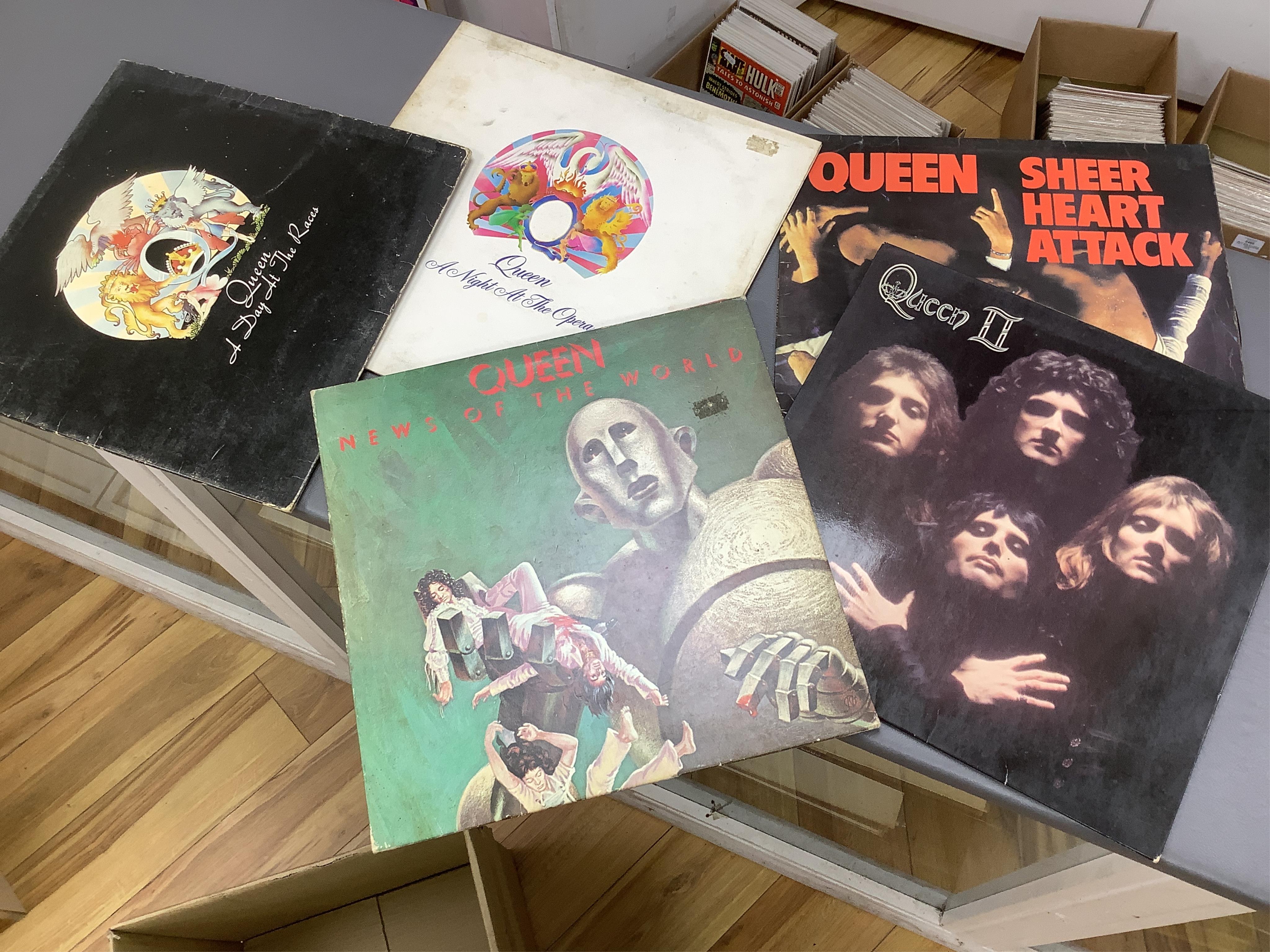Queen related LPs and other items comprising; fifteen albums including; Queen II, Sheer Heart Attack, a Night at the Opera, Jazz (with poster), Live Killers, Starfleet Project, Mr. Bad Guy, Fun in Space, Strange Frontier